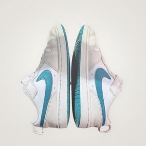 Nike kids white and teal blue low top sneakers